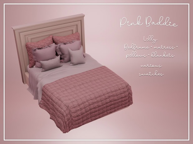 Pink Baddle Lilly bed set with duvet, mattress, pillows, and blankets in blush tones. Perfect for cozy bedrooms featuring stylish, high-quality bedding and decorative cushions.