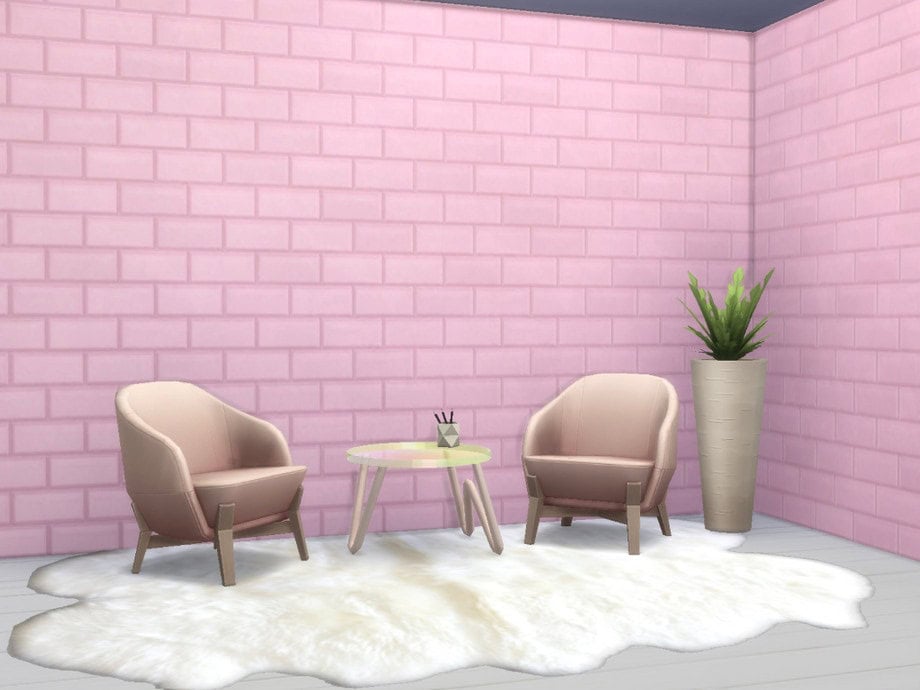 Modern cozy corner with pink brick accent wall, plush beige armchairs, small coffee table, green potted plant, and soft white rug — perfect for stylish interior decor and home comfort.