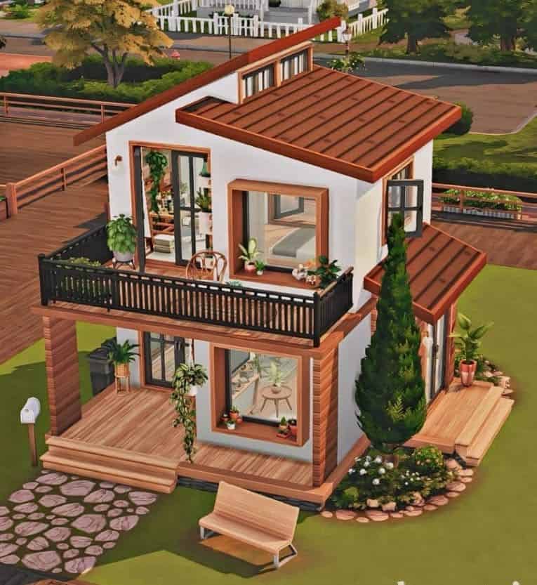 Contemporary two-story tiny house with modern design, large windows, spacious balcony, and lush landscaping, perfect for small living or vacation retreats.